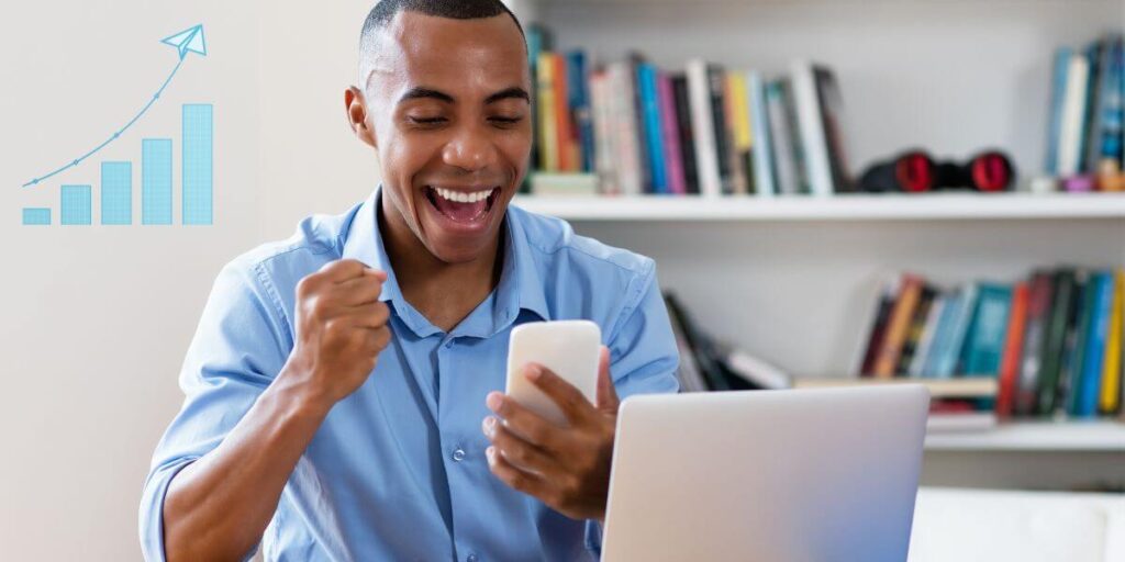 A happy guy making money from a successful affiliate marketing business