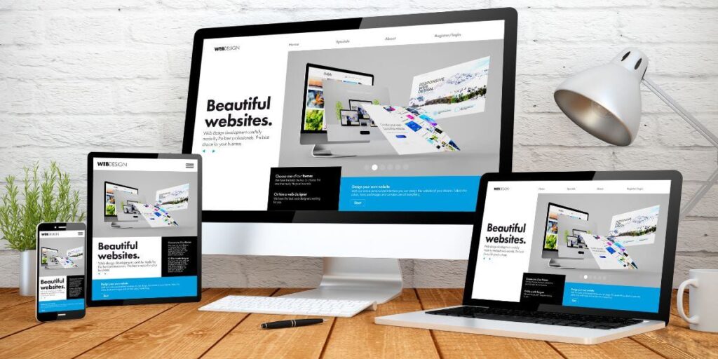 Picture of an iMac with a laptop, tablet, and mobile phone device