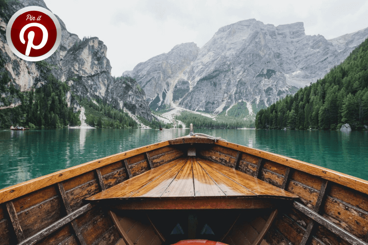 The travel category - a boat by the mountains